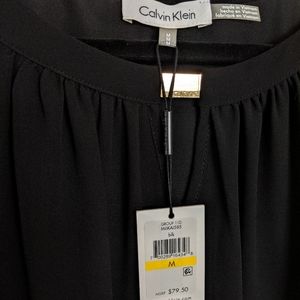 New! Calvin Klein sheer blouse. Size Medium
